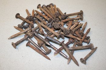 Pile Of Antique Stamped Hand Wrought Square Nails