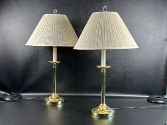 A Pair Of Lightweight Brass-Toned Candlestick Lamps With Pleated Bell Shades