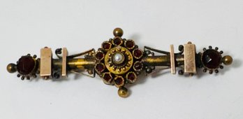VICTORIAN GOLD FILLED AND RED STONE BROOCH