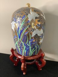 LARGE ASIAN URN WITH WOOD DISPLAY