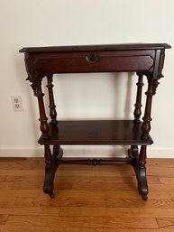Antique Mahogany Wheeled Side Table With Petite Front Drawer One Shelf And Original Key