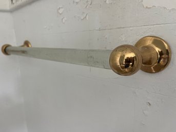 A Set Of Glass Towel Bars With Brass Escutcheons