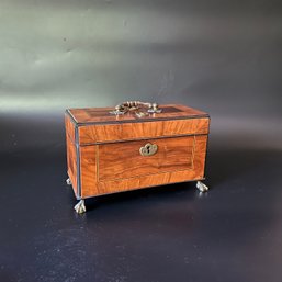 An Antique Inlaid Box With Paw Foot Legs