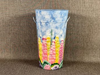 A Tall Hand-Painted Metal Bucket With Side Handles