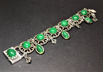 Silver Tone Green Bakelite Plastic Link Bracelet Having Dangling Charms