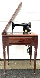 Vintage SInger Sewing Machine And Cabinet