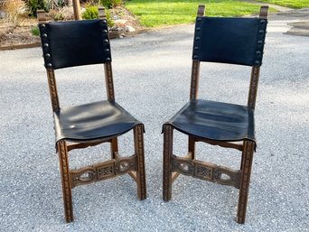 A Pair Of Vintage Carved Oak And Leather Side Chairs In Hacienda Style