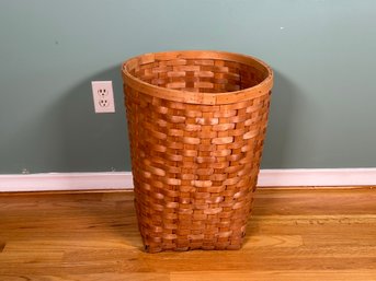 A Tall Slat-Woven Basket