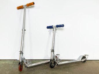 A Pair Of Razor Scooters