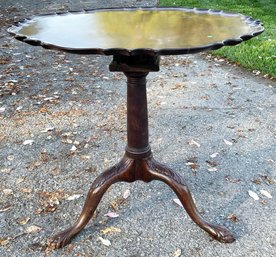 An Antique Mahogany Pie Crust Flip Top Table