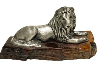 Metal Lion Figurine On Lacquered Natural Wood Base