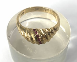 14K Gold Ladies Ring With Garnets , 3 Gross Dwt.