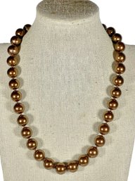 Fine Chocolate Simulated Pearl Necklace Having Silver Tone Clasp