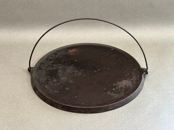 A Vintage Round Griddle In Cast Iron By Griswold