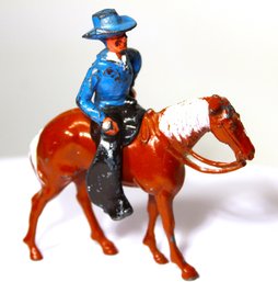 Two-part Vintage Painted Lead Cowboy On Horse Toy