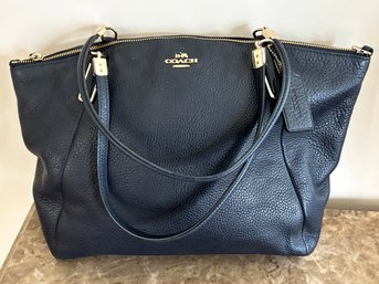 A Large Purse By Coach