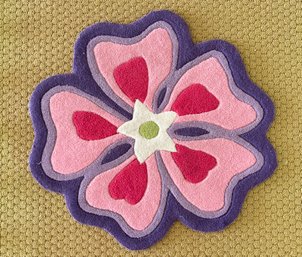 A Modern Wool Flower Form Scatter Rug