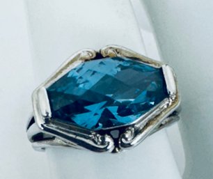 STERLING SILVER FACETED BLUE TOPAZ RING