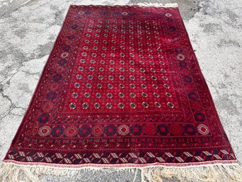 A Vintage Hand Knotted And Dyed Bokhara Rug