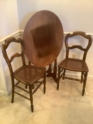 Pair Of Wooden Caned Side Chairs With Table