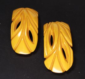 Pair Matched Carved Butterscotch Bakelite Dress Clips