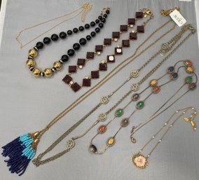 Seven Gold Tone Necklaces