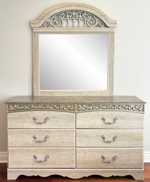 A Vintage Dresser With Faux Marble Top And Matching Mirror