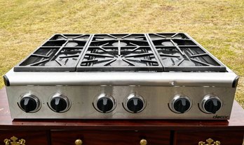 A Dacor Propane 6 Burner Stainless Steel Stove Top