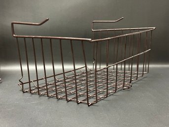 A Set Of Four Wire Shelf Baskets
