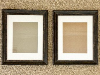 A Pair Of Photo Frames