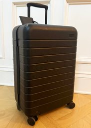 An Away Carry On Suitcase, Used Once - With Built In Charger