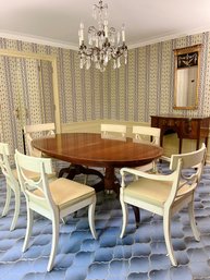 A Double Spider Leg Pedestal Extending Dining Table With Leaves And 8 Chairs