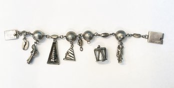 Interesting Nickle Charm Bracelet