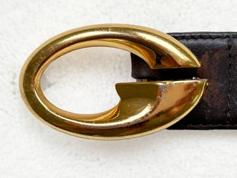 A Vintage Leather Belt With Gucci Belt Buckle