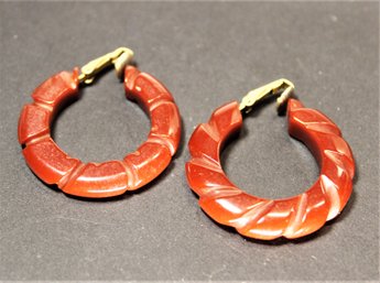 Vintage Red Carved Bakelite Plastic Clip Hoop Earrings