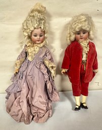 Two Beautiful Vintage Dolls Of Different Style Hair And Dressing In Multicolor.