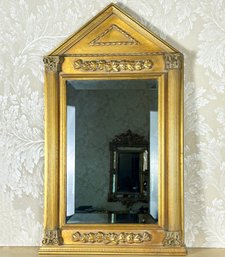 A Gilt Framed Mirror With Fluted Column Motif