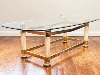 A Brass And Glass Coffee Table With Fluted Oak Columnar Legs