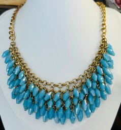 PRETTY GOLD TONE FACETED BLUE GLASS MULTI LAYER FLAPPER STYLE NECKLACE