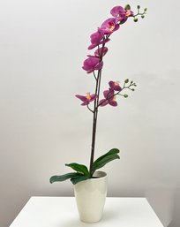 A Fine Quality Faux Orchid In A Ceramic Pot
