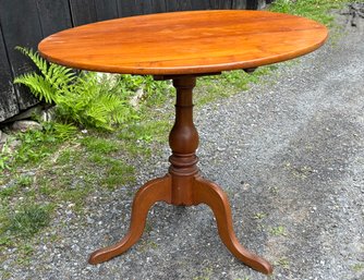 A Vintage Cherry Tilt Top Table