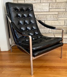 Cool Black Faux Leather And Chrome Lounge Chair