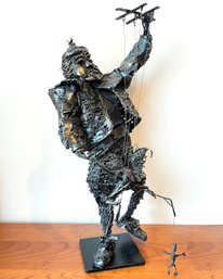 A Bronze Sculpture, Clown Piper Puppetter, By Kenneth Rowden (British, 1935-1999)