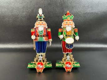 A Pair Of Nutcracker Santa Stocking Hangers By Pacific Rim In Molded Resin