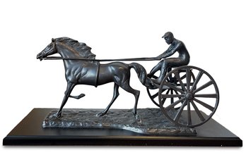 A Vintage Bronze Cast Of A Jockey, Mounted On Board