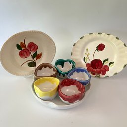 An Adorable Assortment Dishes - Dips, Ceramic Trays, And Beautiful Floral Plates
