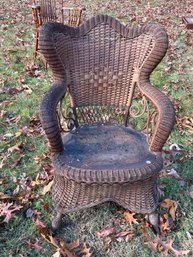 ANTIQUE WICKER ARM CHAIR