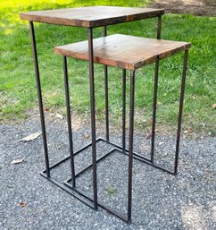 A Pair Of Modern Raw Edge Wood Nesting Side Tables With Metal Bases