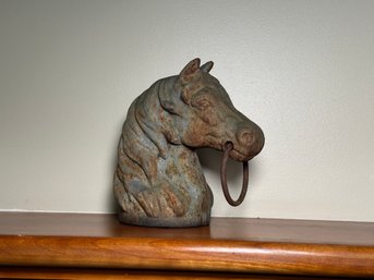 A Concrete Horse Head Figure