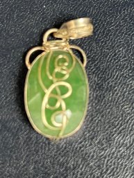 Artisan Inspired Wire Wrapped Jade Pendant In A Silver Bezel Setting